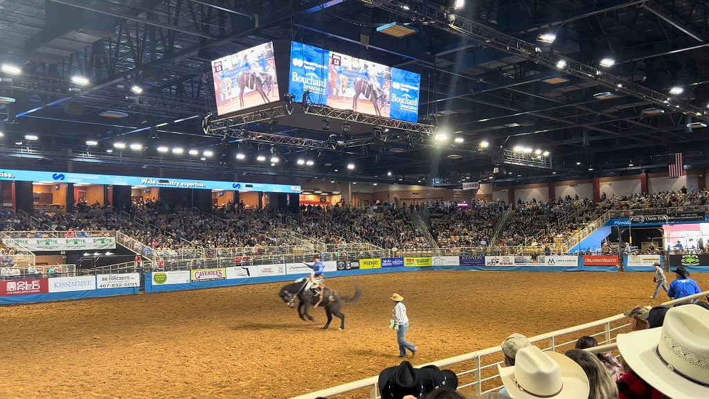 Cowboy riding a bull at the Silver Spurs Rodeo in Kissimmee, a highlight among family-friendly events in Orlando