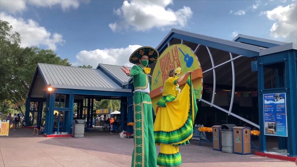 Performers in colorful traditional attire at SeaWorld’s Viva La Música festival in Orlando
